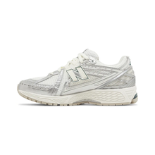 1906R - "Silver Metallic Cream"